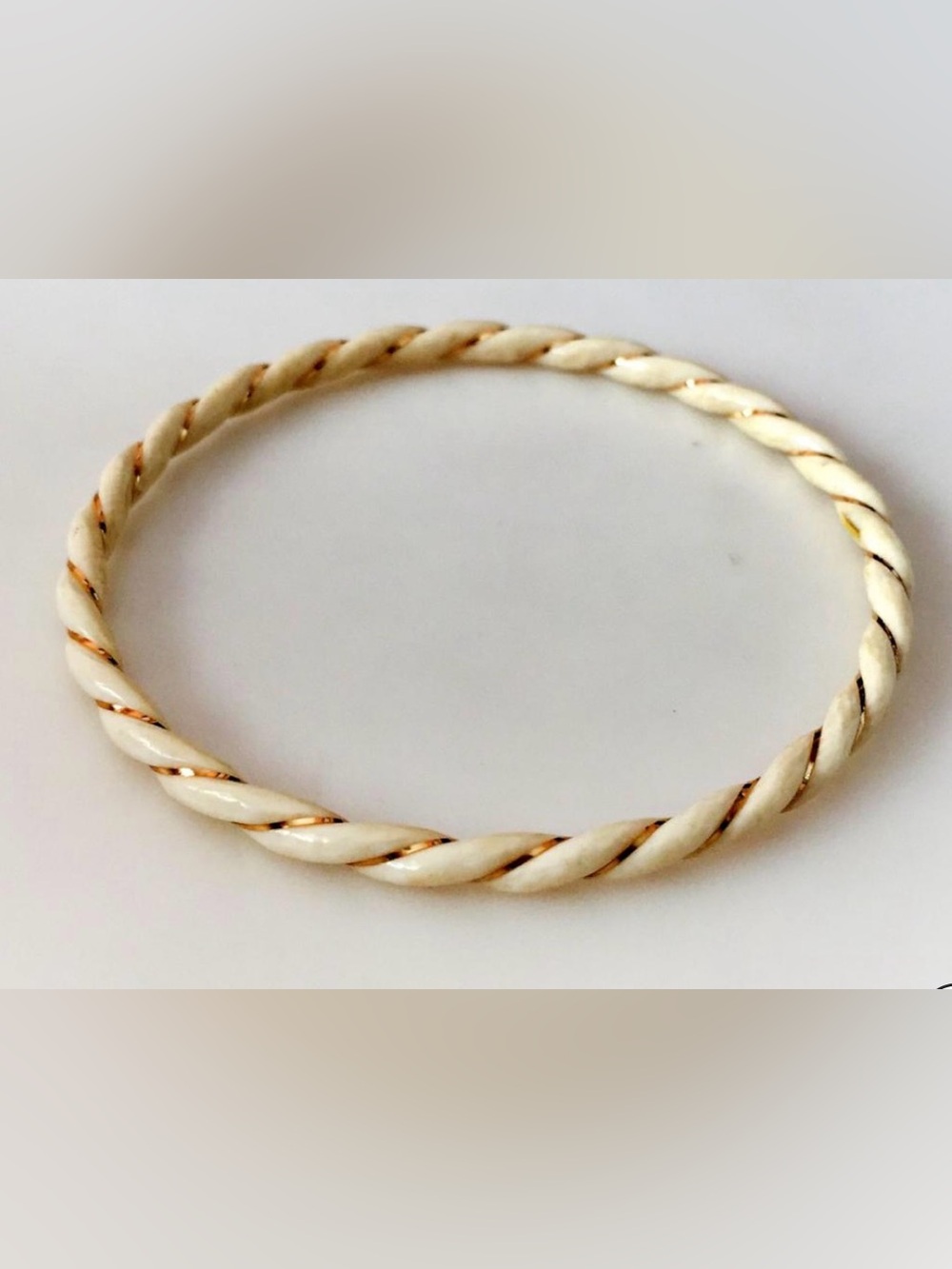 Vintage carved twisted design ivory bangle bracelet embellished with 14k yellow